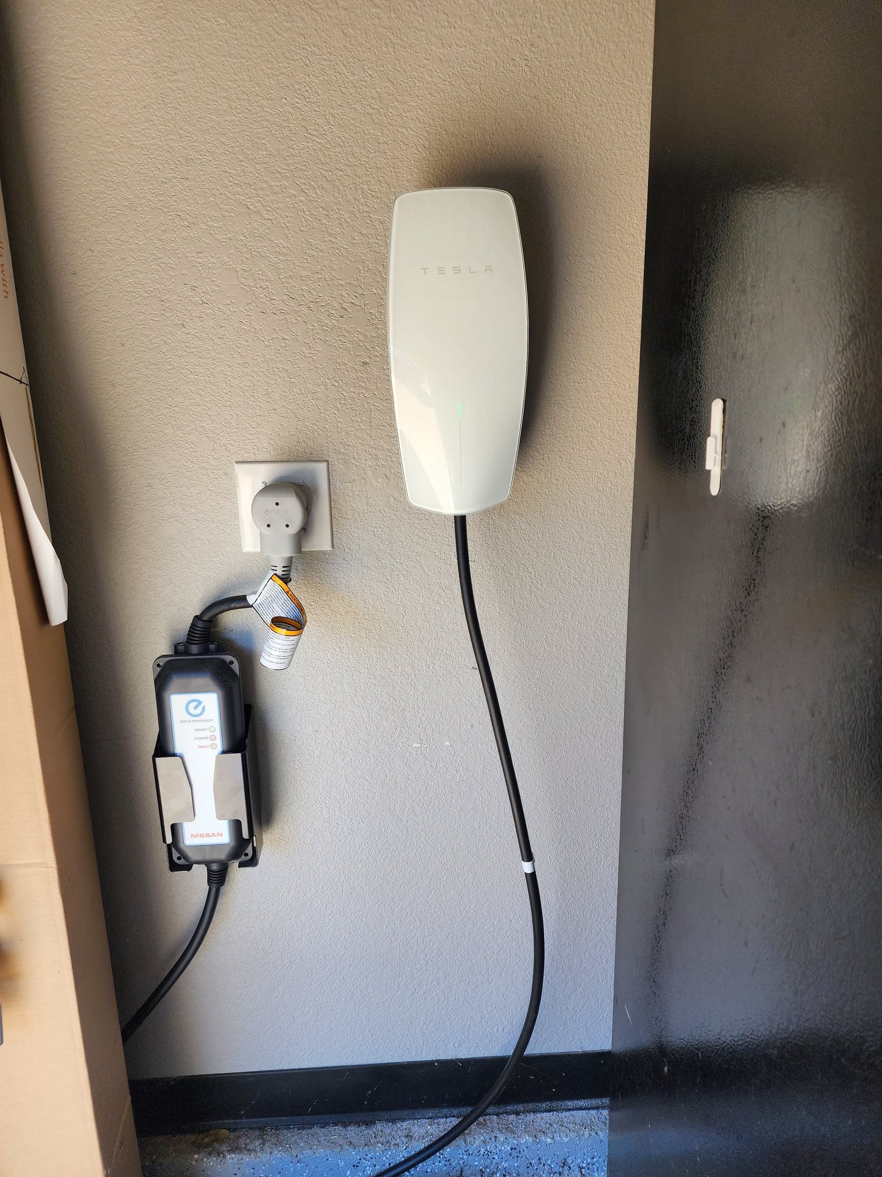 Tesla Wall Connector EV charger installed in a garage in Sacramento, CA